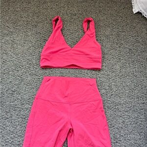 Women's Lululemon Coral matching bra and biker shorts set